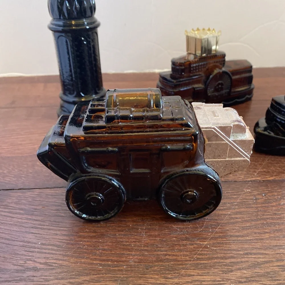 Vintage Avon cologne bottles, Lot Of 4, ‎ Water pump, 2 Steamboats, Stagecoach